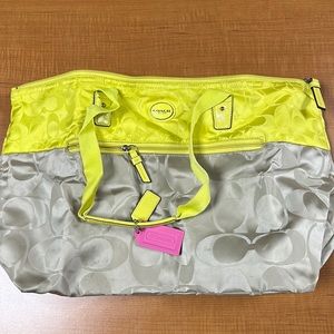 Super cute coach tote with detachable mini bag.